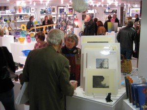 Patrons browse the gift shop and socialize after getting a book signed