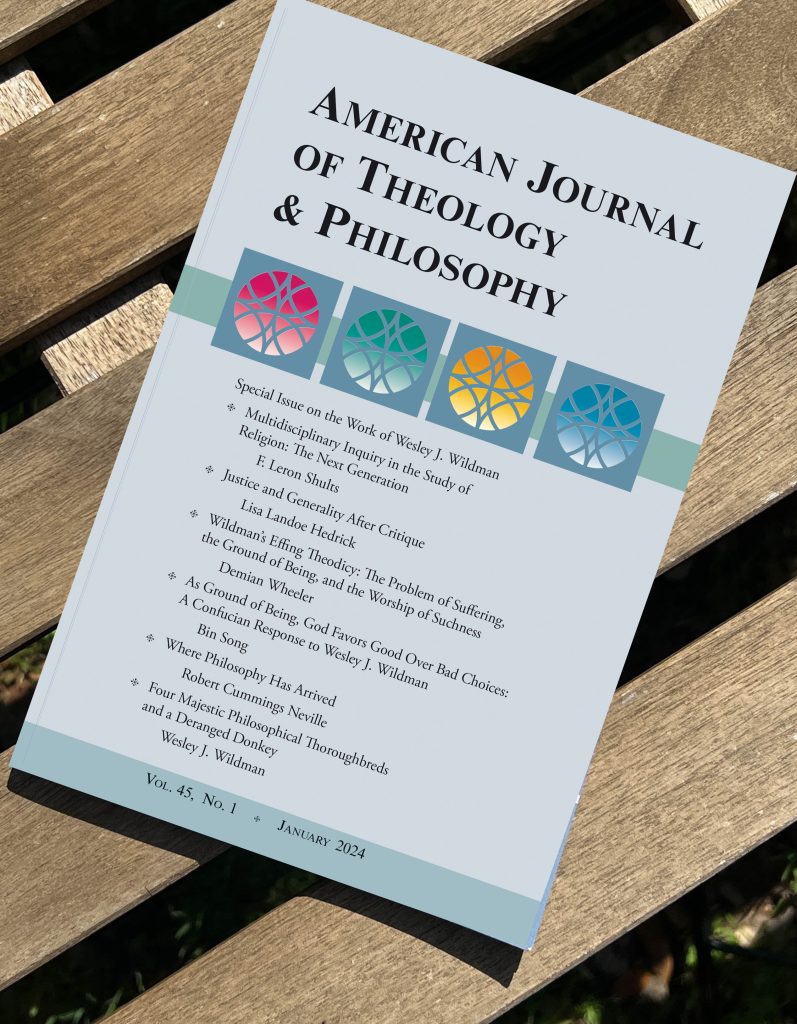 American Journal of Theology & Philosophy on a wooden bench outside