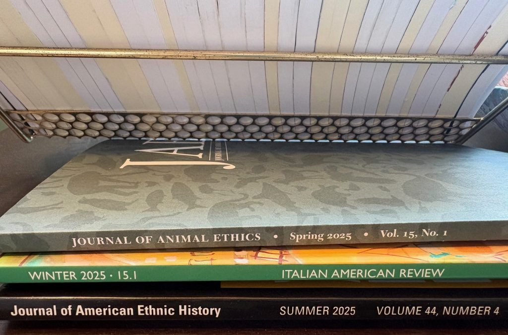 Photo of the spines of three journal issues: Journal of Animal Ethics, Italian American Review, and Journal of American Ethnic History