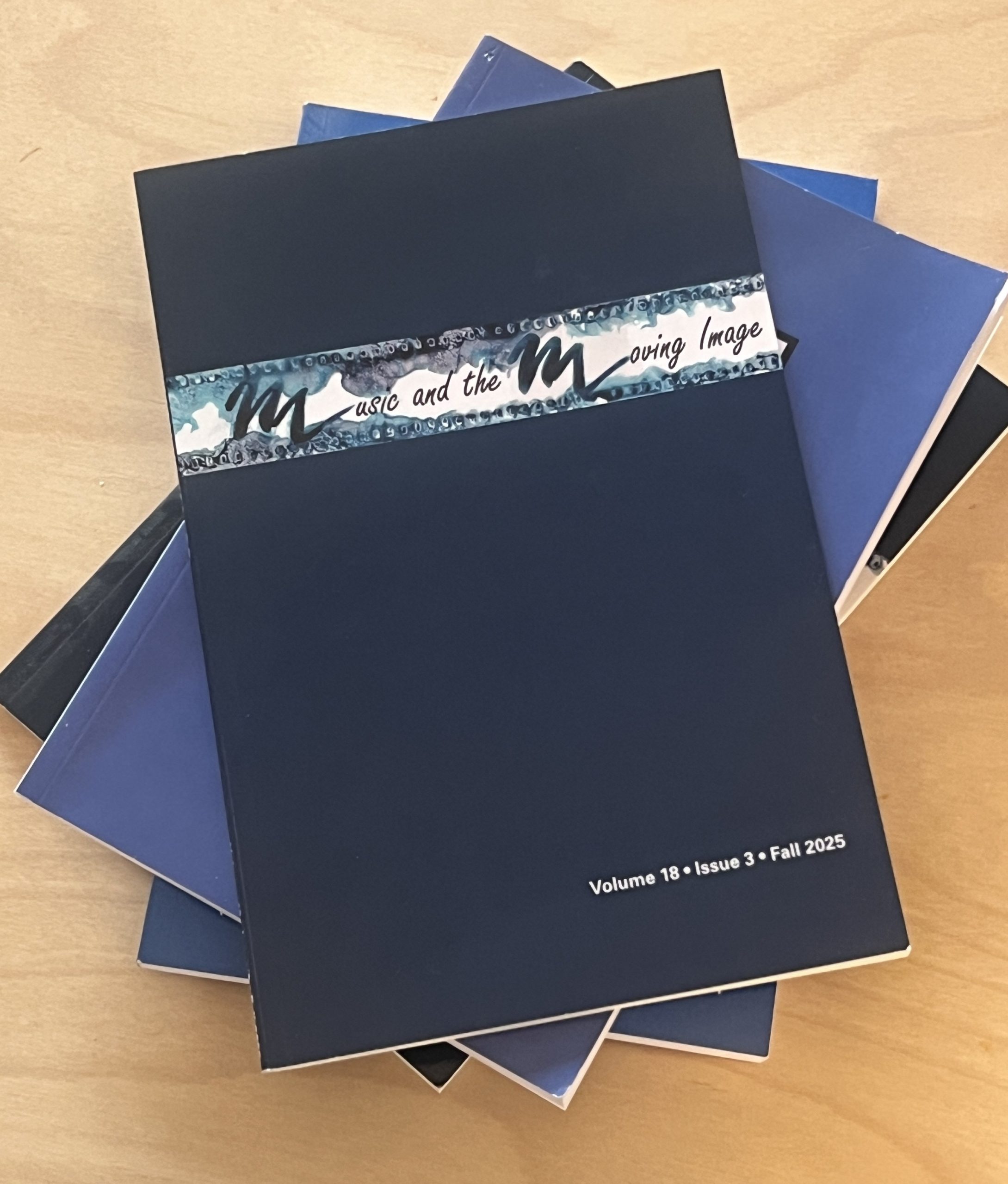 Cover of Music and the Moving Image, in Volume 18, Number 3, Fall 2025.
Dark blue background with white rectangle near the top that has a watercolor design and title information.